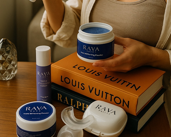 a woman holding Rava Smiles' whitening poweder, with other products in front of her